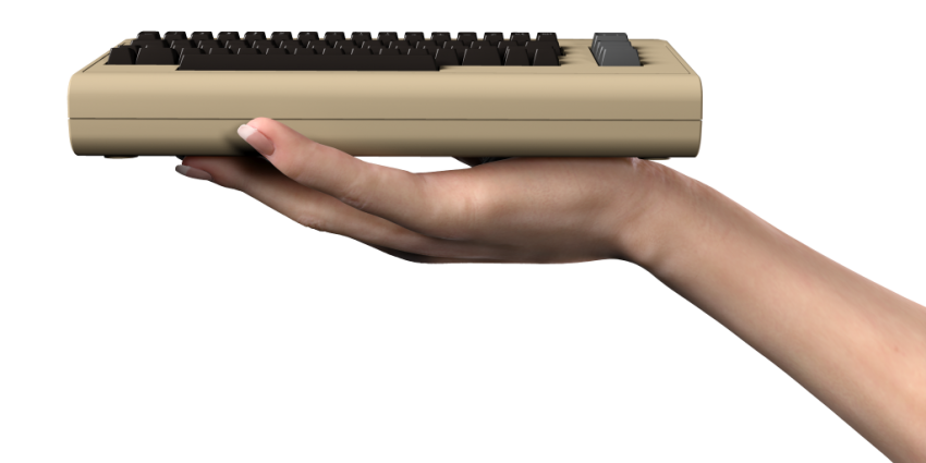 THEC64-Render6-hand-1024x512.thumb.png.b7a3e25413f8391d56908ebe199b7589.png